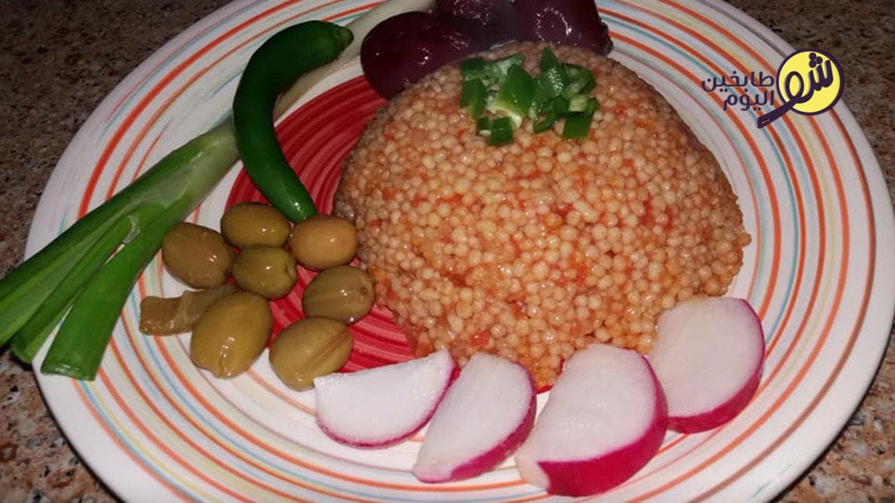 How to Make Meftoul with Tomatoes