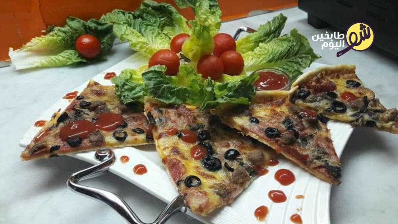 كيف نحضّر أطيب وأسهل بيتزا منزلية؟