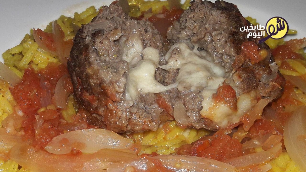 Cheese-Stuffed Kebabs with Tomato-Onion Sauce