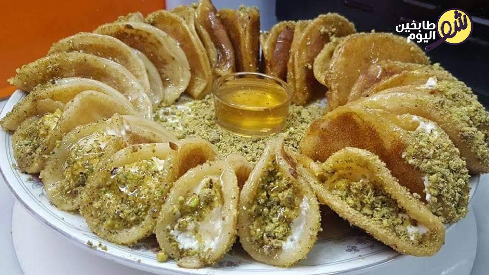 اقماع القطايف بالقشطة