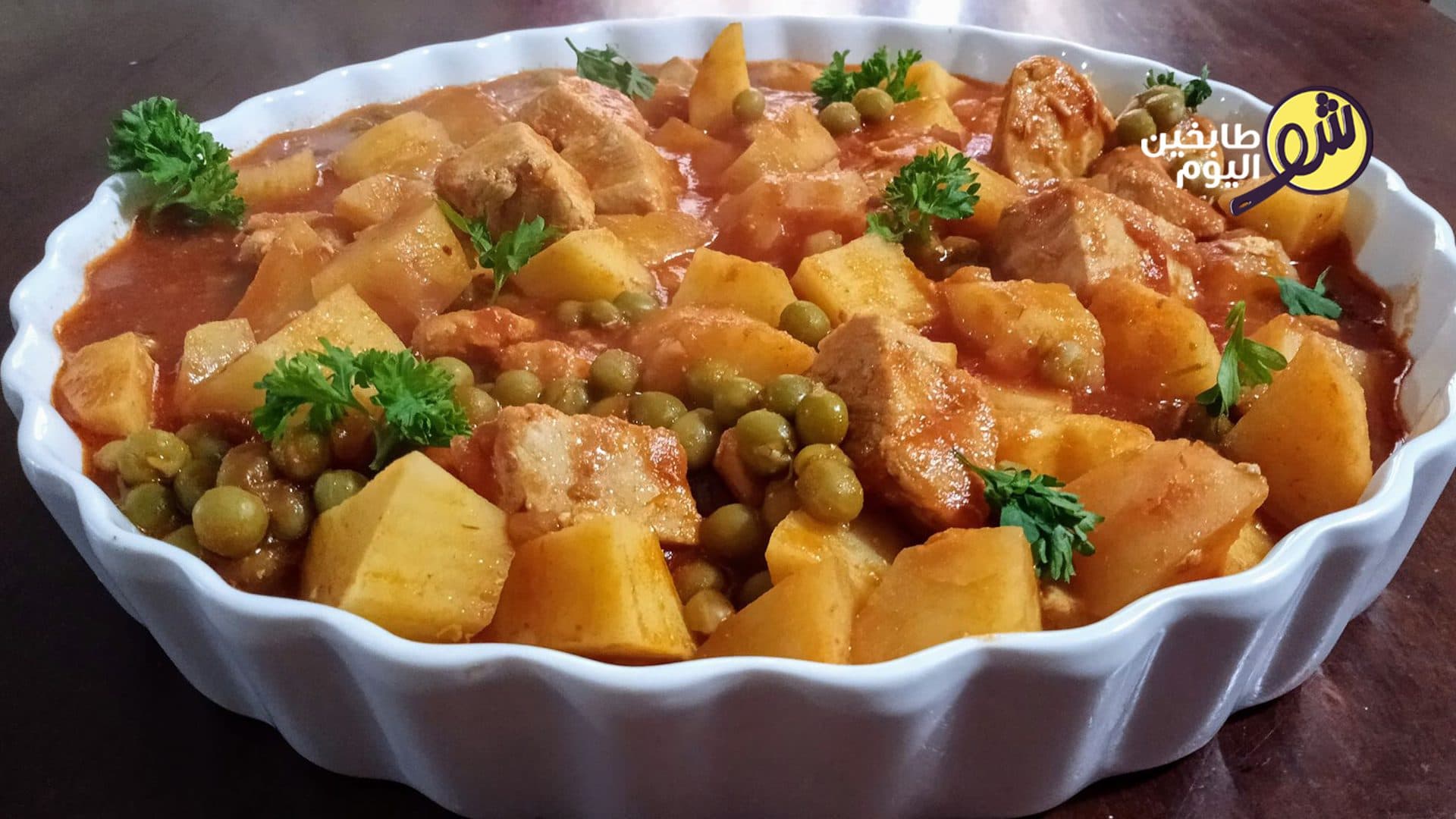 Chicken with Potatoes and Peas in Curry