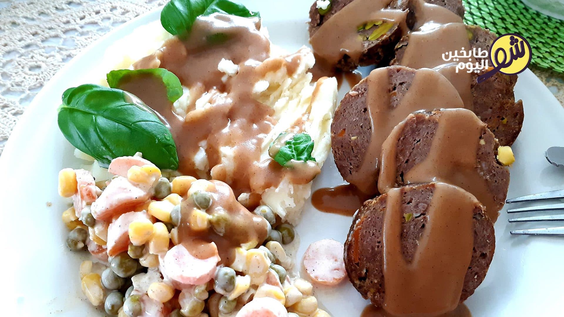 Beef Roll with Aleppo Pistachios, Mashed Potatoes, and Gravy