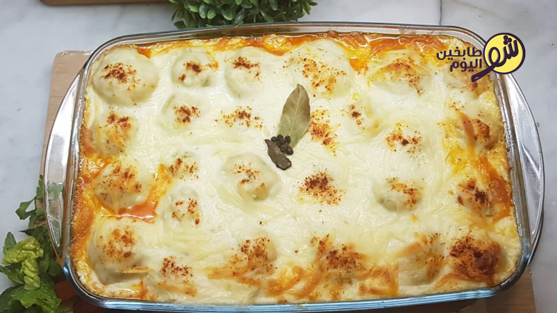 Baked Dish of Potato Balls with Chicken and Béchamel Sauce