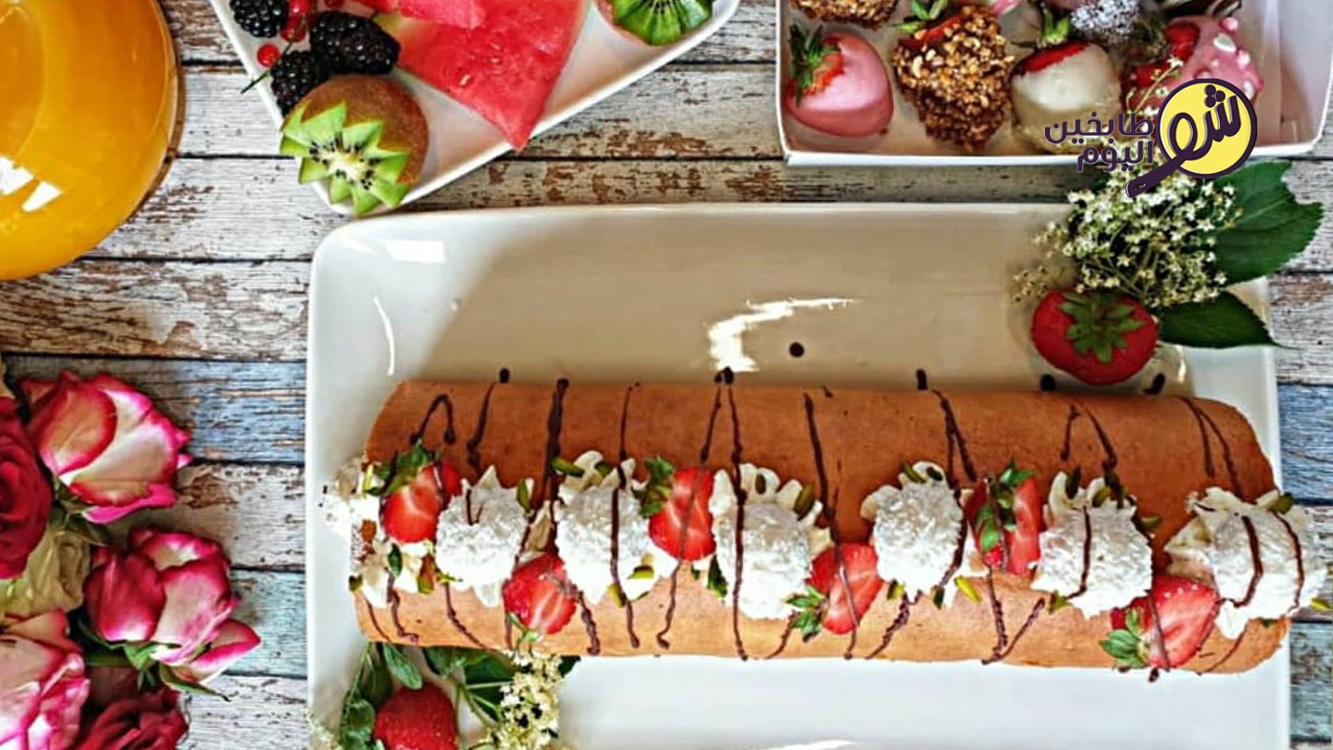 Swiss Roll with Cream and Strawberry Sauce